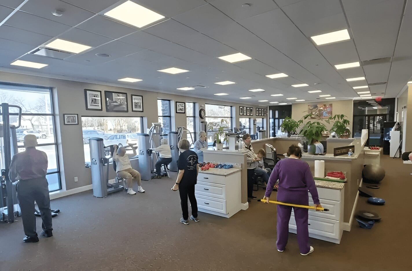 A group of people in an office setting.